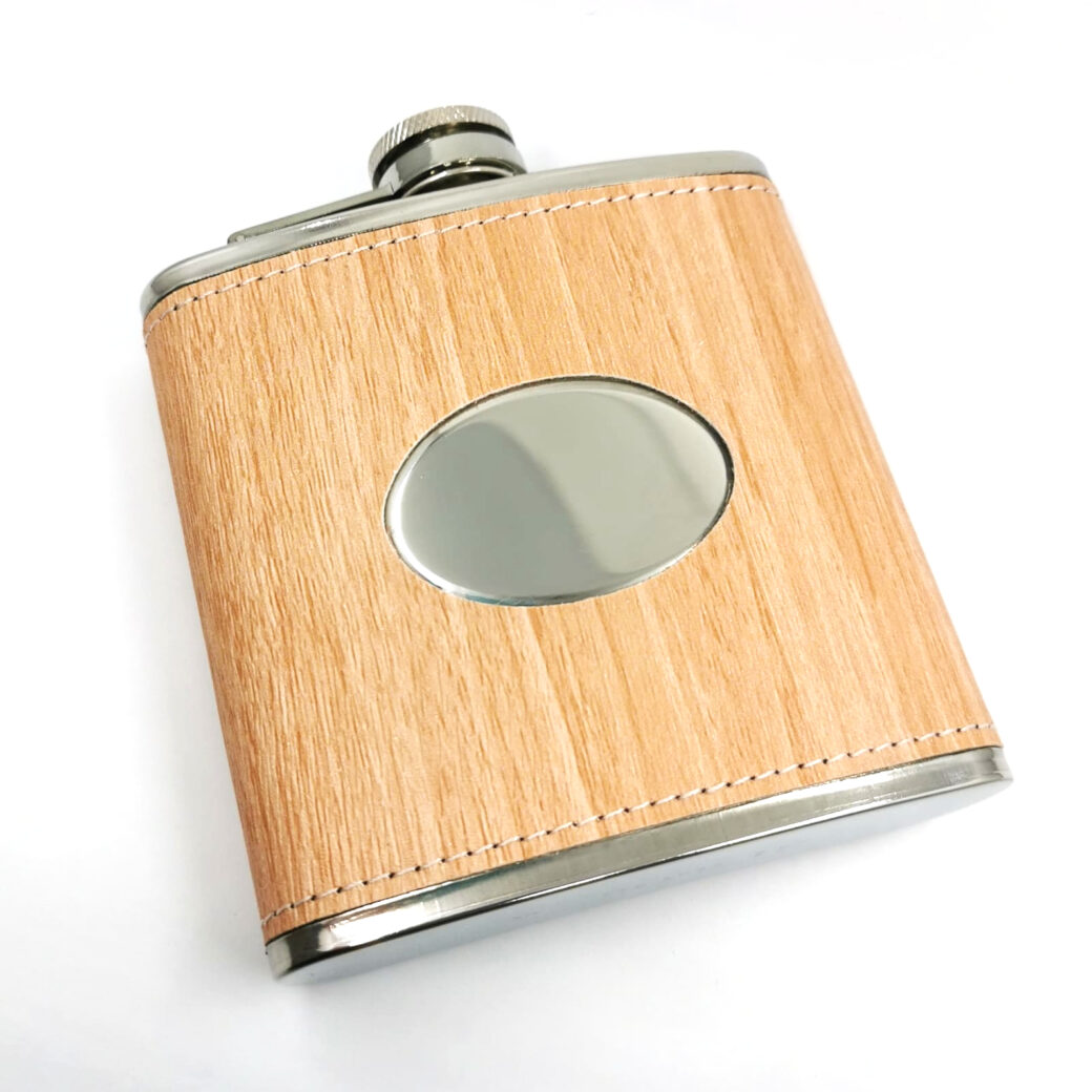Personalised 6oz wood effect hip flask with engraving panel, captive lid and satin lined gift box. Ideal for birthdays, weddings and outdoor gifting.